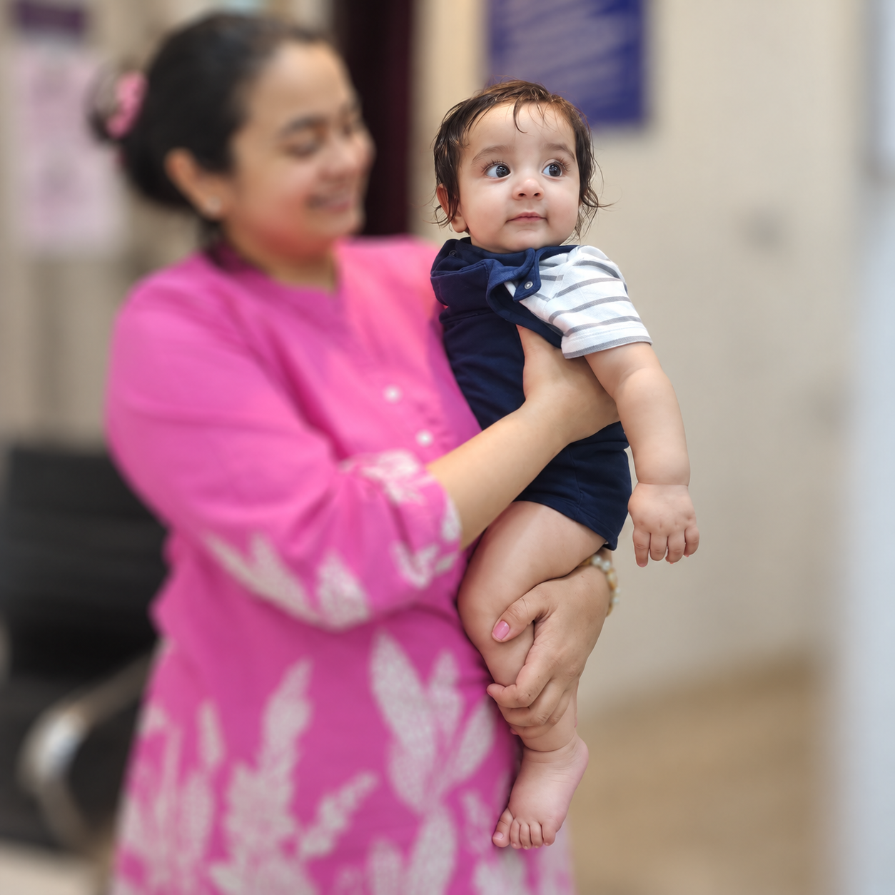 A little miracle bringing endless smiles to the family.